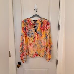Yellow floral ruffled blouse, size XL, from White House Black Market.
